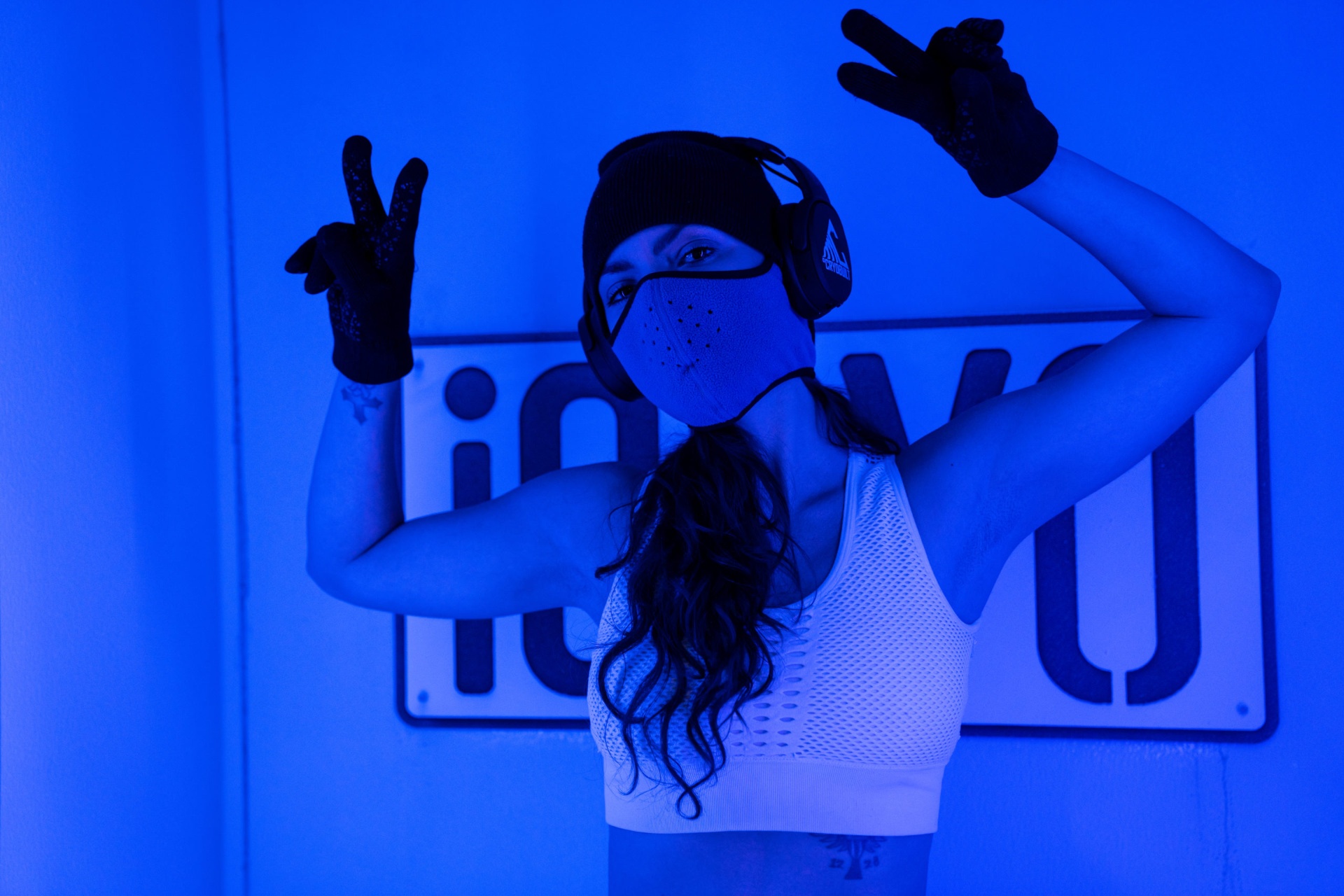 Person experiencing whole body cryotherapy session at iCRYO Helotes